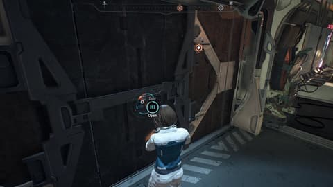 Protagonist opening a door in Kadara